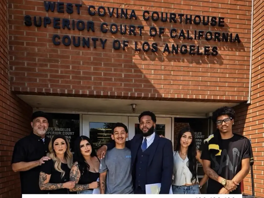 Grace Legal Group attorney with a client and family outside the West Covina Courthouse